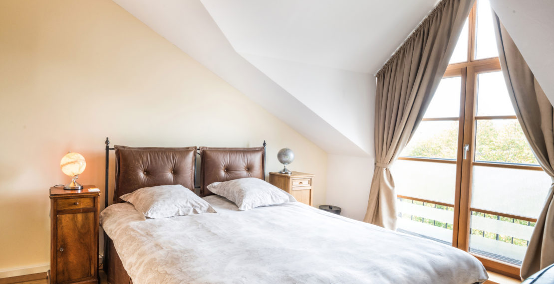 Double bed in a hotel room