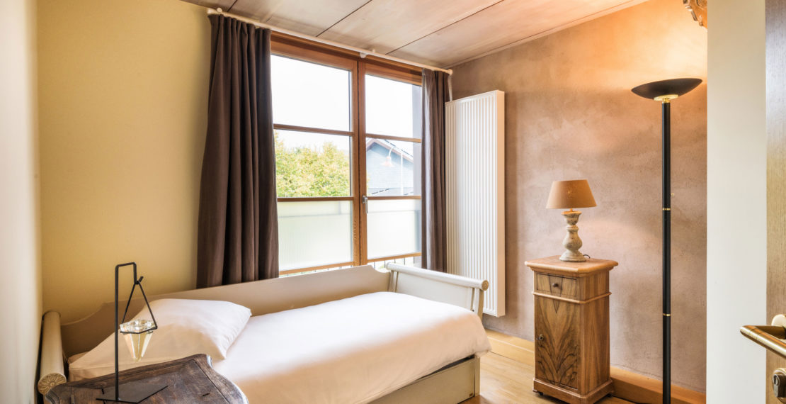 Single bed in a hotel room