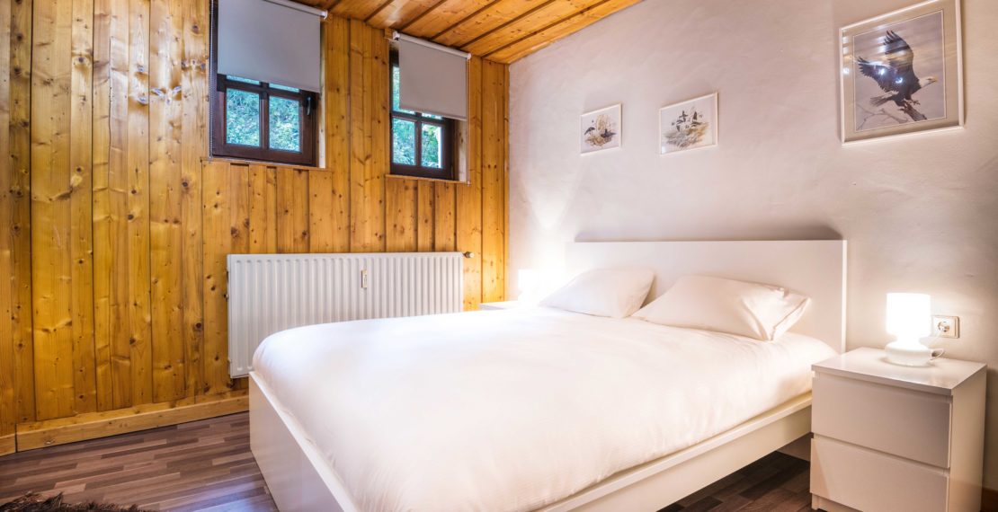 Double bed in hotel room