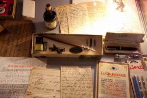 Inkwell and old papers on a table
